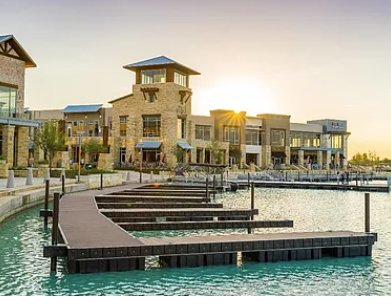 Waterfront retail boardwalk at a Houston master-planned community