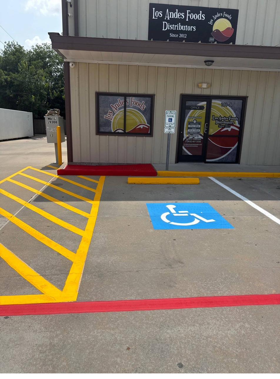 Freshly striped parking lot with crisp ADA stenciling